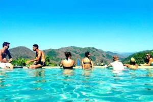 A peaceful infinity pool reflecting the sky at a couples retreat, inviting partners to relax and immerse themselves in the Strengthen Your Relationship Couples Retreat experience, designed to rebuild trust and closeness.