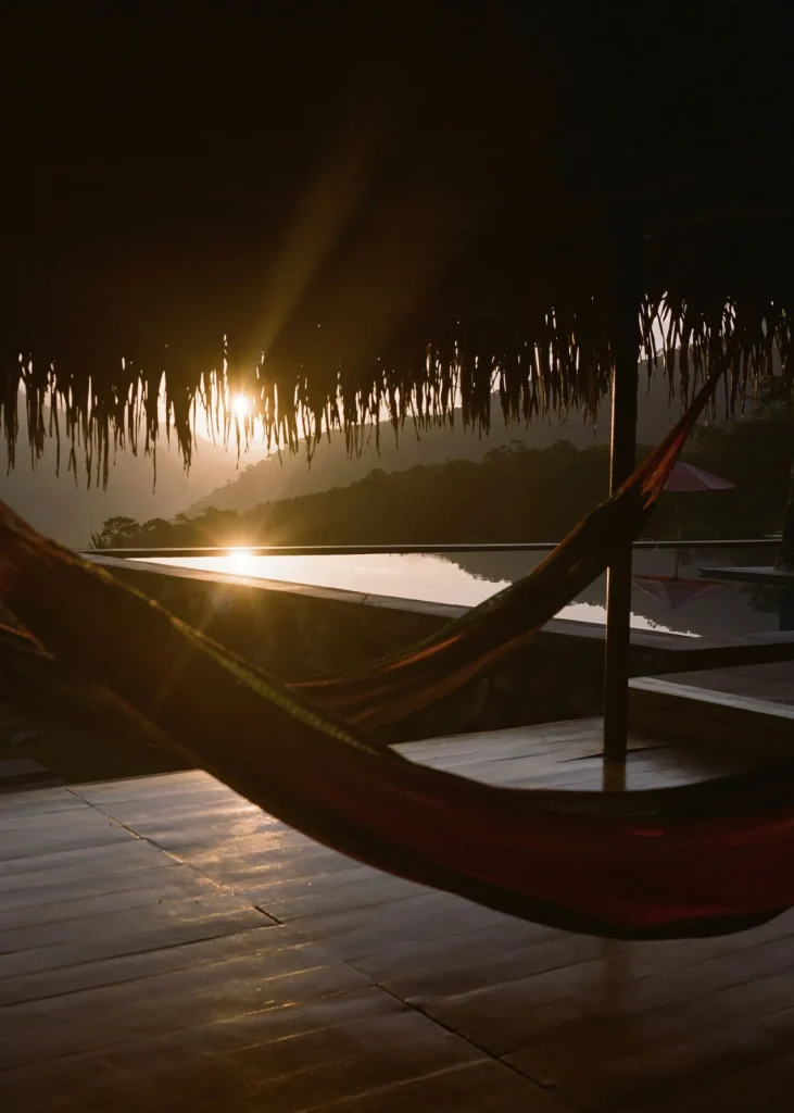 Reconnect-at-Hold-Me-Tight-Verana A cozy hammock with a sunset view at Verana, an ideal space for couples to reconnect during the Hold Me Tight retreat.