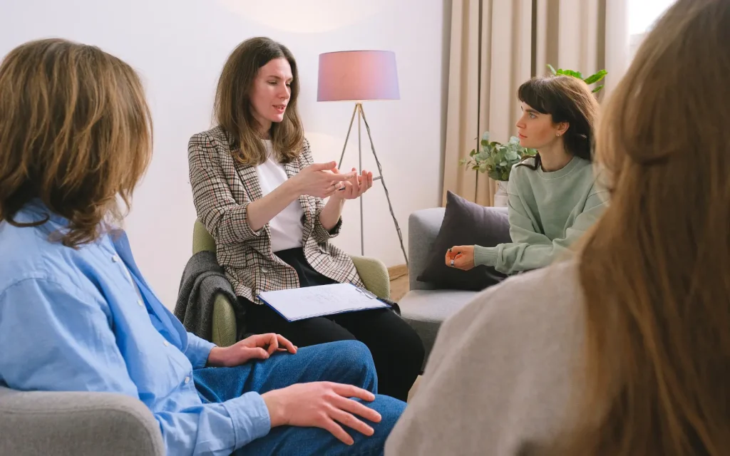 Therapist-support-groups A group of female therapists supporting each other during a therapist support group