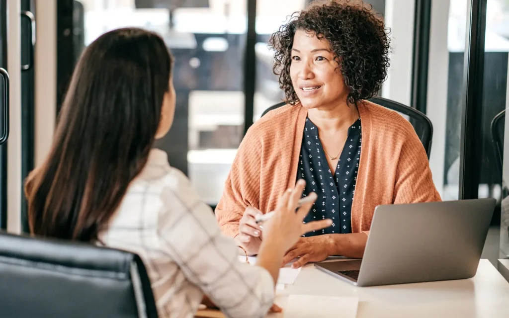 A woman and a psychologist talking during a clinical psychological interview for neurological testing in Los Angeles