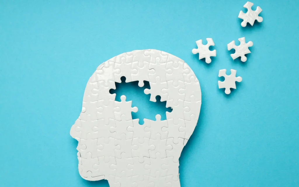 Snapshot-of-neuropsychological-function A puzzle of a human head with some pieces missing, representing the snapshot of neuropsychological function that testing can uncover