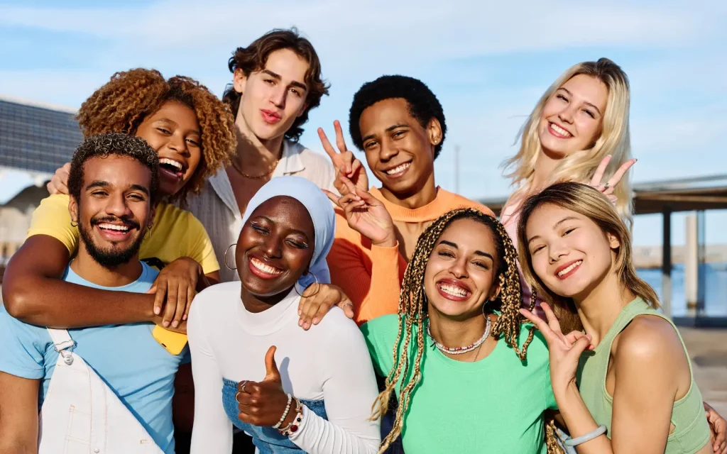 A diverse interracial group of young people, representing GGPA's culturally attuned approach to couples therapy in Los Angeles