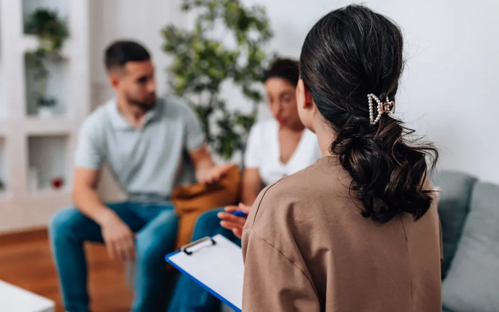 A mixed race couple in a marriage counseling session in Los Angeles