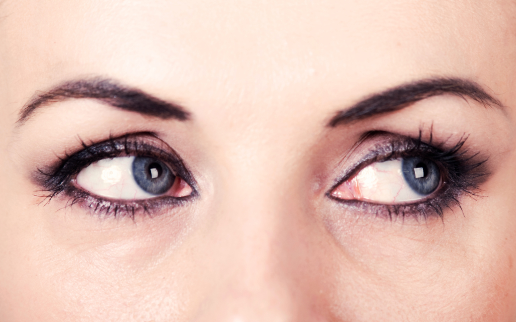A woman's eyes looking to her left, representing the eye movements common in brainspotting sessions for trauma release in LA