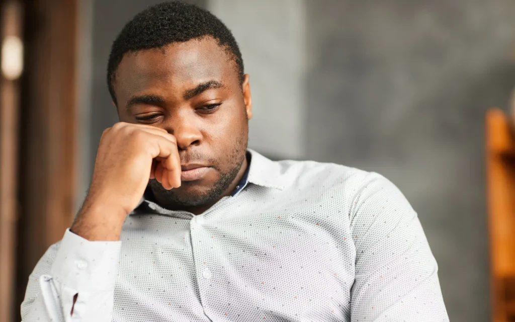 Crisis-therapy-in-LA A man looking depressed, representing the importance of seeking therapy in Los Angeles in cases of crisis