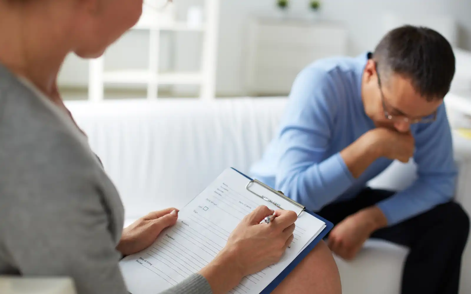 A man crying in a trauma focused CBT session in Los Angeles