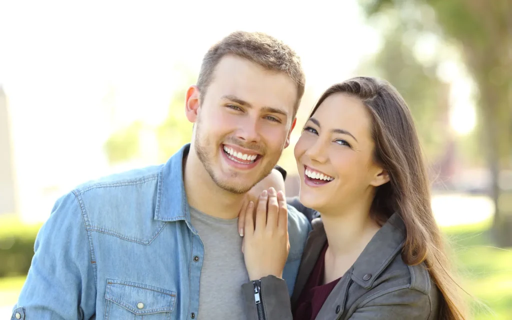 Couples-therapy-for-neurodiverse-people A smiling happy couple after couples therapy for neurodiverse folx in Los Angeles