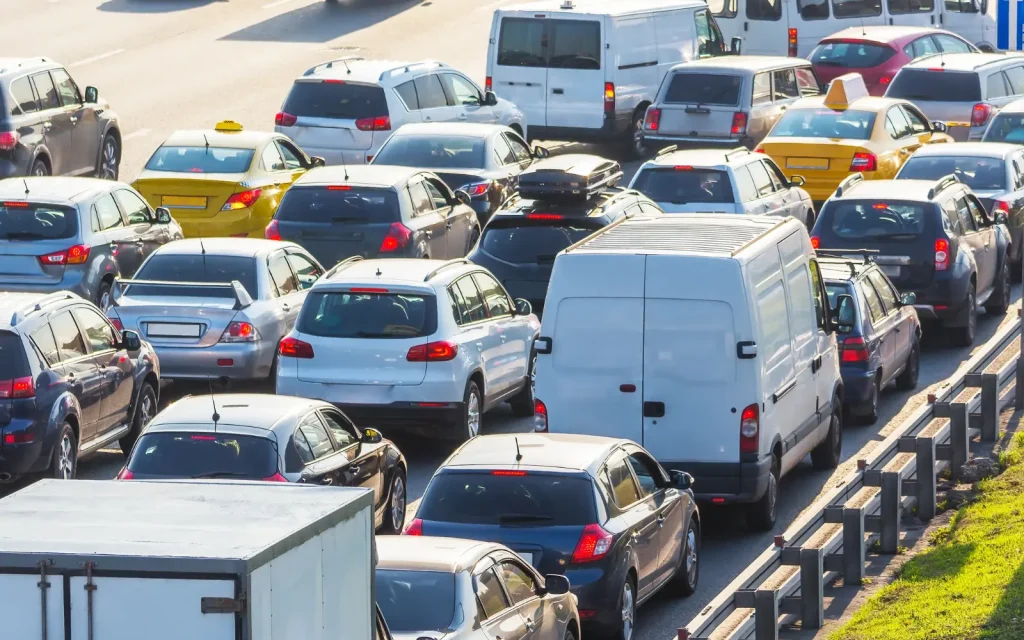 A queue of traffic in downtown LA, representing the stresses that keep people from regular therapy attendance