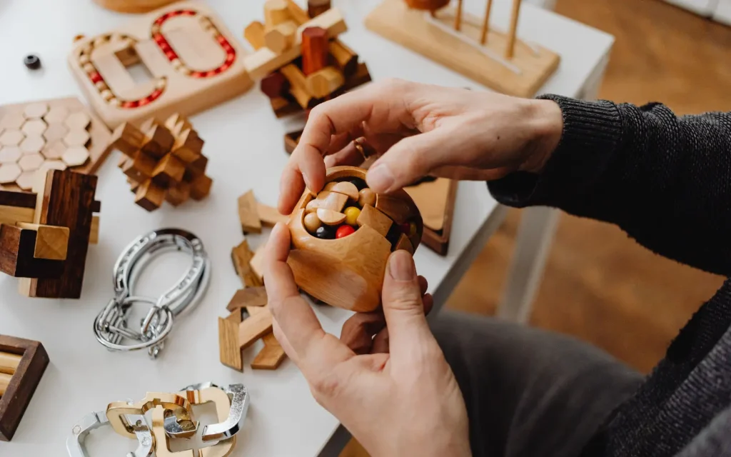 Adult-fidget-toy-sensory-support An adult with ADHD playing with a sensory stimulation fidget toy