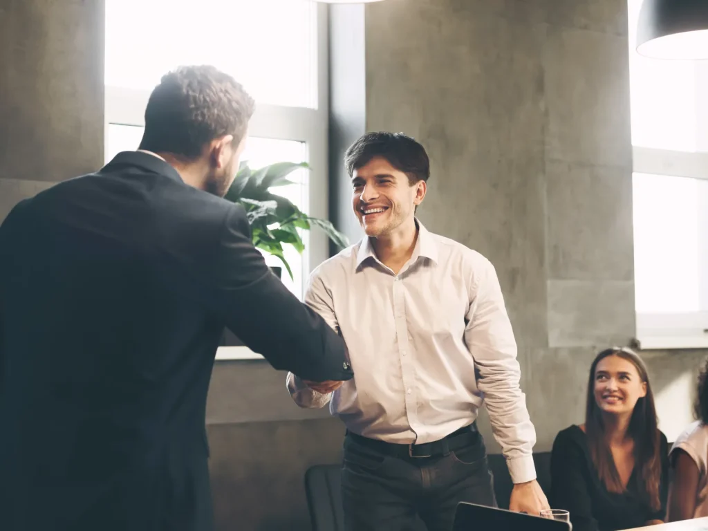 A man receiving a promotion at work